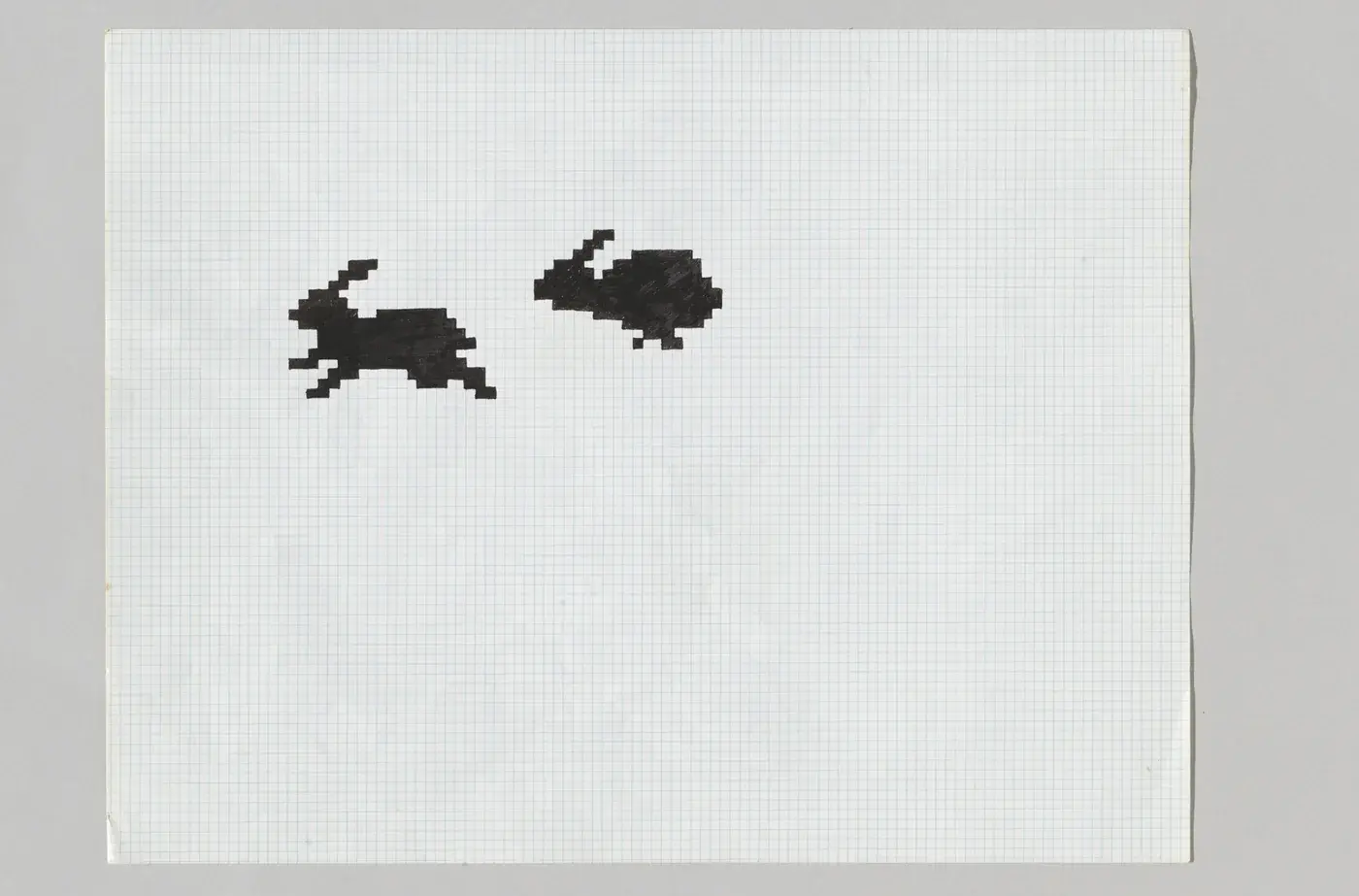 Susan Kare’nin kareli kâğıt üzerindeki orijinal Macintosh ikon eskizleri